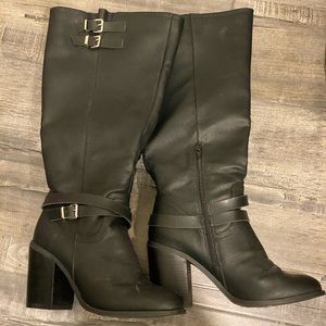 Knee high faux leather boots.